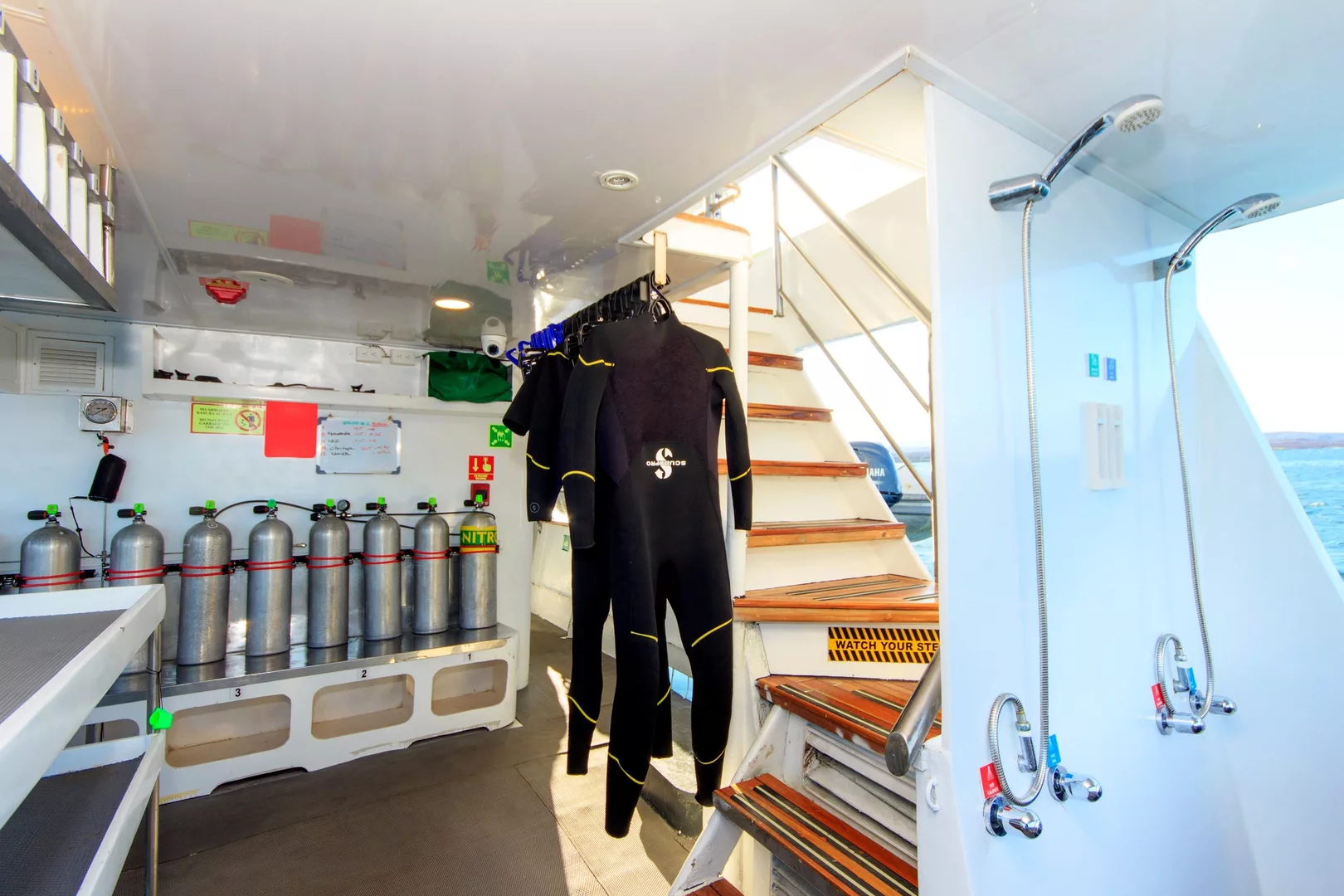 Divers on the dive platform of the Aqua