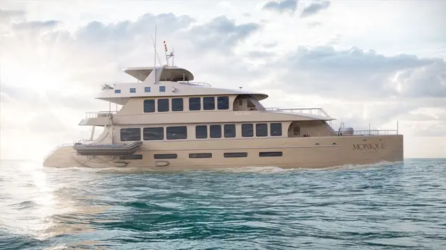 The Monique catamaran under way in the Galapagos