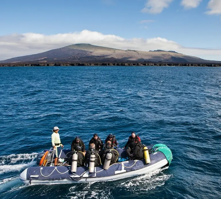 Diver entering the water from the Galapagos Aggressor III