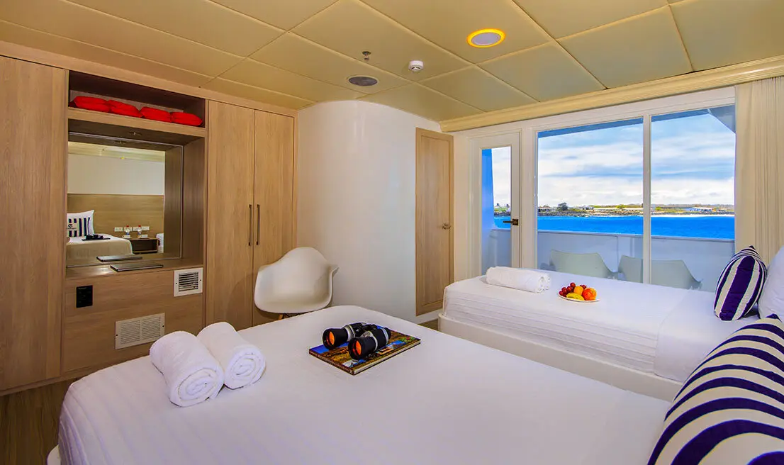 Twin balcony stateroom on the Treasure